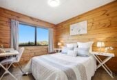 4 beds 2 baths house with double garage and views, Construction: Durable Hardiplank exterior with a classic metal tile roof. 1 km to Long Bay College, 1/15 Flavia Close, Torbay, Auckland