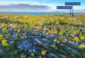 4 beds 2 baths house with double garage and views, Construction: Durable Hardiplank exterior with a classic metal tile roof. 1 km to Long Bay College, 1/15 Flavia Close, Torbay, Auckland