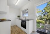 Must sell, Rangitoto College zone, 2 beds 1 bath home with garage, A huge 4.5m x 3.0m lower-floor storage/workshop, Massive 4.1m x 5.6m rear deck and large lawn area, just minutes from Browns Bay Beach, Freyberg Park, and the vibrant shopping & dining precinct. 0.7 km to Browns Bay School, 1/9 Phillipa Place, Browns Bay, Auckland