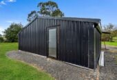 208 m2 Lifestyle 4 beds 2 baths house with sleepout on 1.29 ha land, 3-bay garaging, substantial 4-bay shedding with 3-phase power, and an additional 2-bay garage, close to Te Kauwhata village, you’ll have access to schools, childcare, medical facilities, emergency services, a golf course, sports clubs, a library, and a range of shops and cafés, approx 83 km to Auckland, 232 Martin Road, Waerenga, Waikato