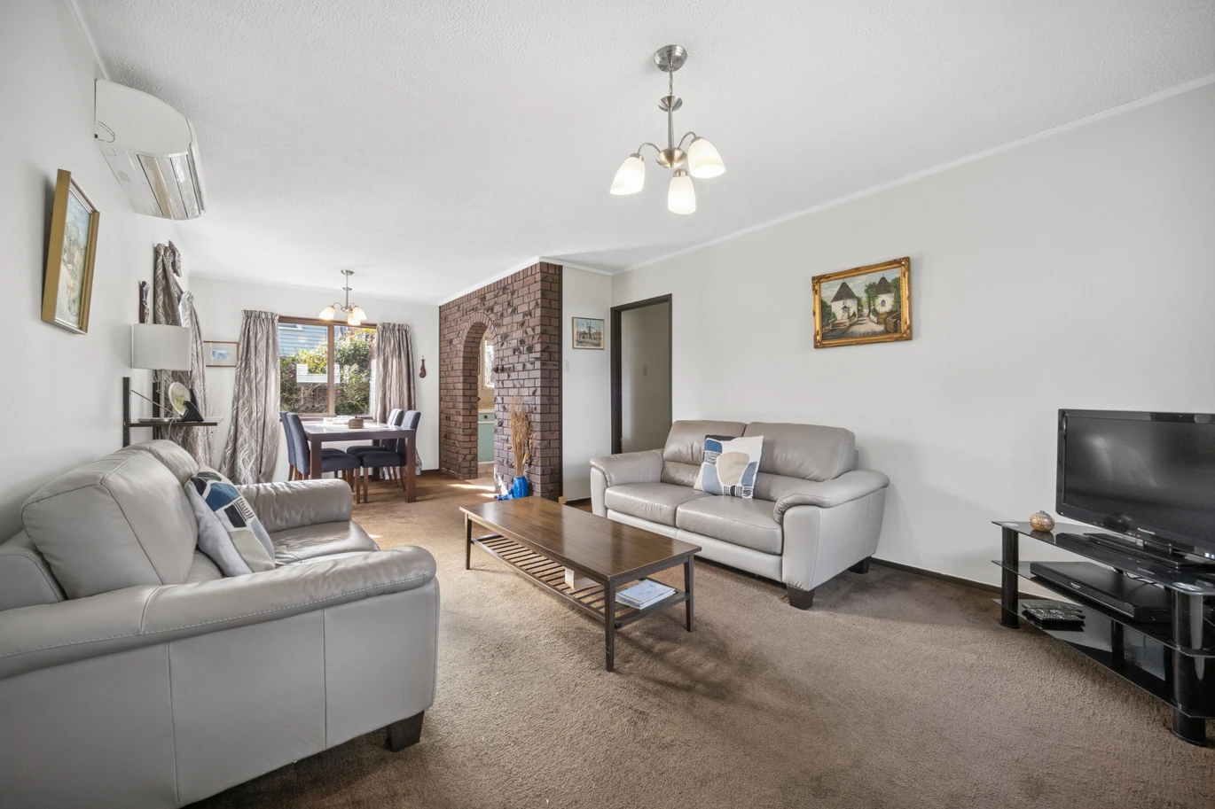 Once in 26 years, Constructed in block, 2 beds 1 bath home with garage, close to Green Bay Village, quality schooling, and public transport, With a park and playground just a short stroll away, 1/39 Cliff View Drive, Green Bay, Auckland