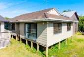 Vendor Says Sell – All Offers Considered, 4 beds 2 baths house on share of 1356m2, Recently constructed studio (CCC issued), Relocated 3-bedroom dwelling (unfinished), Expansive garage space, Walking distance to Sylvia Park, IKEA, and public transport (bus & train), Prospective purchasers are advised that certain works on the property may not have obtained neighbouring cross-lease consent, 19 Mclennan Road, Mount Wellington, Auckland