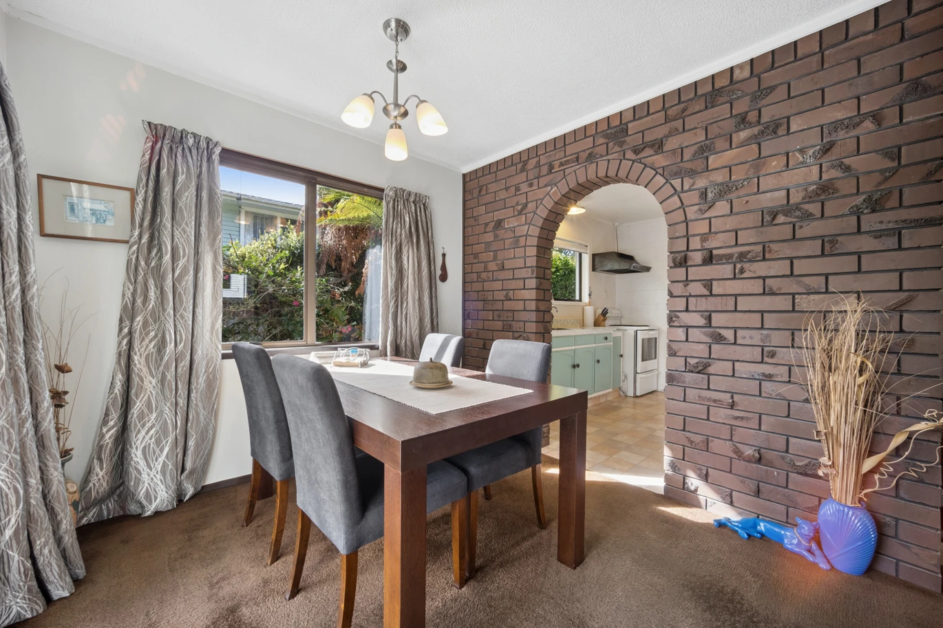 Once in 26 years, Constructed in block, 2 beds 1 bath home with garage, close to Green Bay Village, quality schooling, and public transport, With a park and playground just a short stroll away, 1/39 Cliff View Drive, Green Bay, Auckland