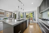 Sea views, 247m2 5 beds 3.5 baths house with double garage on 429m2 section, in an uphill from the harbour’s edge and opposite a native bush reserve, walking distance to Blockhouse Bay Village, local amenities, and coastal reserves, in zone for Blockhouse Bay School and Lynfield College, 48 Lewis Street, Blockhouse Bay, Auckland