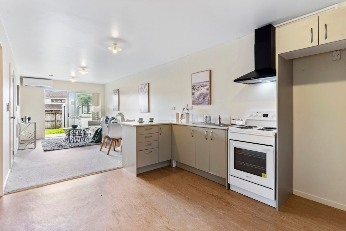 Vendors determined to sell, 67m2 2 beds 1 bath home with car park and a private backyard,, close to shops, schools, easy motorway access, 1/242 Great North Road, Henderson, Auckland