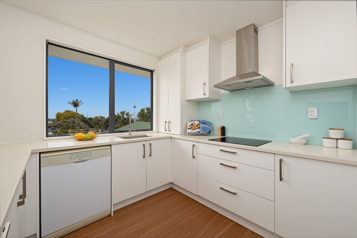 Once in 10 years, Overseas owners, 118m2 4 beds 2 baths house ( 2 beds 1 bath main home + 2 beds 1 bath granny) on 471m2 section, A generous deck, a practical shed and additional storage areas, and on New Year’s Eve you can even enjoy the fireworks from the Sky Tower from home, 140D Hepburn Road, Glendene, Auckland