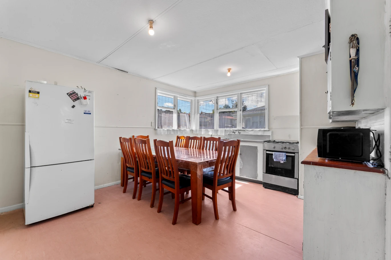 3 beds 1 bath house with double garage on 708m2 section, close to schools, shopping centres, motorway access, 7 Kudu Road Otara, Auckland
