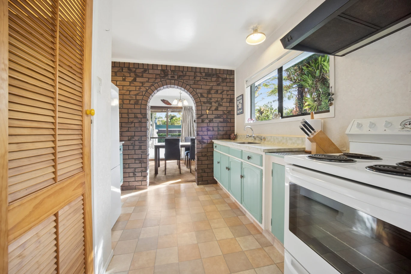 Once in 26 years, Constructed in block, 2 beds 1 bath home with garage, close to Green Bay Village, quality schooling, and public transport, With a park and playground just a short stroll away, 1/39 Cliff View Drive, Green Bay, Auckland