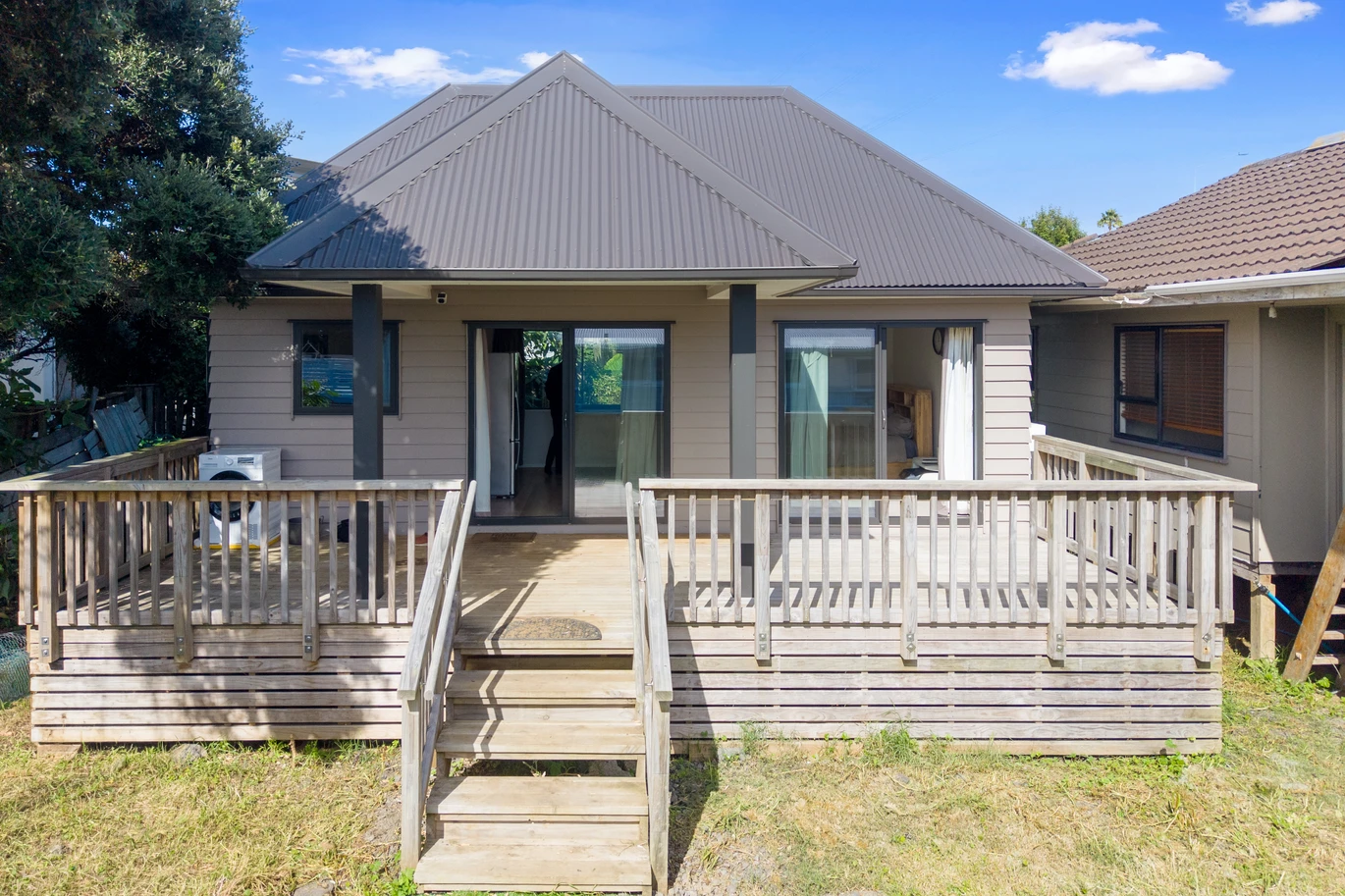 Vendor Says Sell – All Offers Considered, 4 beds 2 baths house on share of 1356m2, Recently constructed studio (CCC issued), Relocated 3-bedroom dwelling (unfinished), Expansive garage space, Walking distance to Sylvia Park, IKEA, and public transport (bus & train), Prospective purchasers are advised that certain works on the property may not have obtained neighbouring cross-lease consent, 19 Mclennan Road, Mount Wellington, Auckland