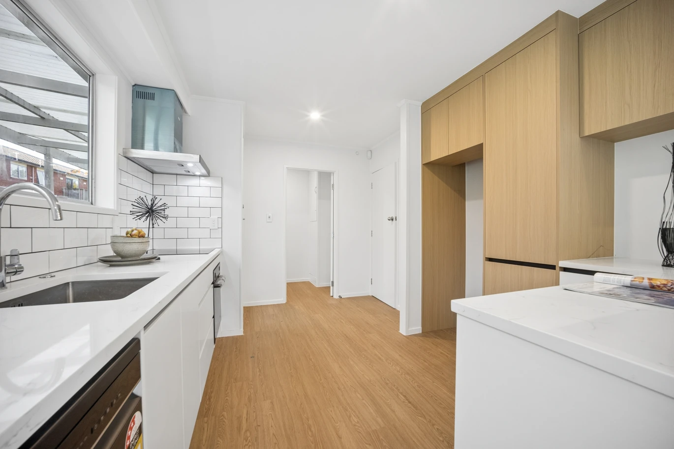 Renovated 3 beds 1 bath house on 1128m2 section, with a deck and pergola, a single garage and additional open parking spaces for up to five vehicles, 12 Glenbervie Crescent Massey,, Auckland
