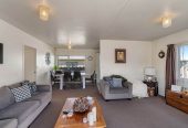 Standalone 3 beds 1 bath house with double garage on 414m2 section, Stroll to Te Atatu Peninsula Market, easy motorway access, 0.2 km to Matipo Road School, 0.9 km to Te Atatu Intermediate, 10A Holman Road, Te Atatu Peninsula, Auckland