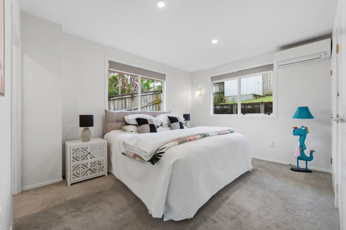Home and Income, 7A Sailfish Drive, West Harbour, Auckland..160m2 4 beds 3 baths house with car parks on 468m2 section, Solid brick & cedar weatherboard cladding, Separate income area to help offset everyday living costs, close to schools, shops, motorway access & local amenities