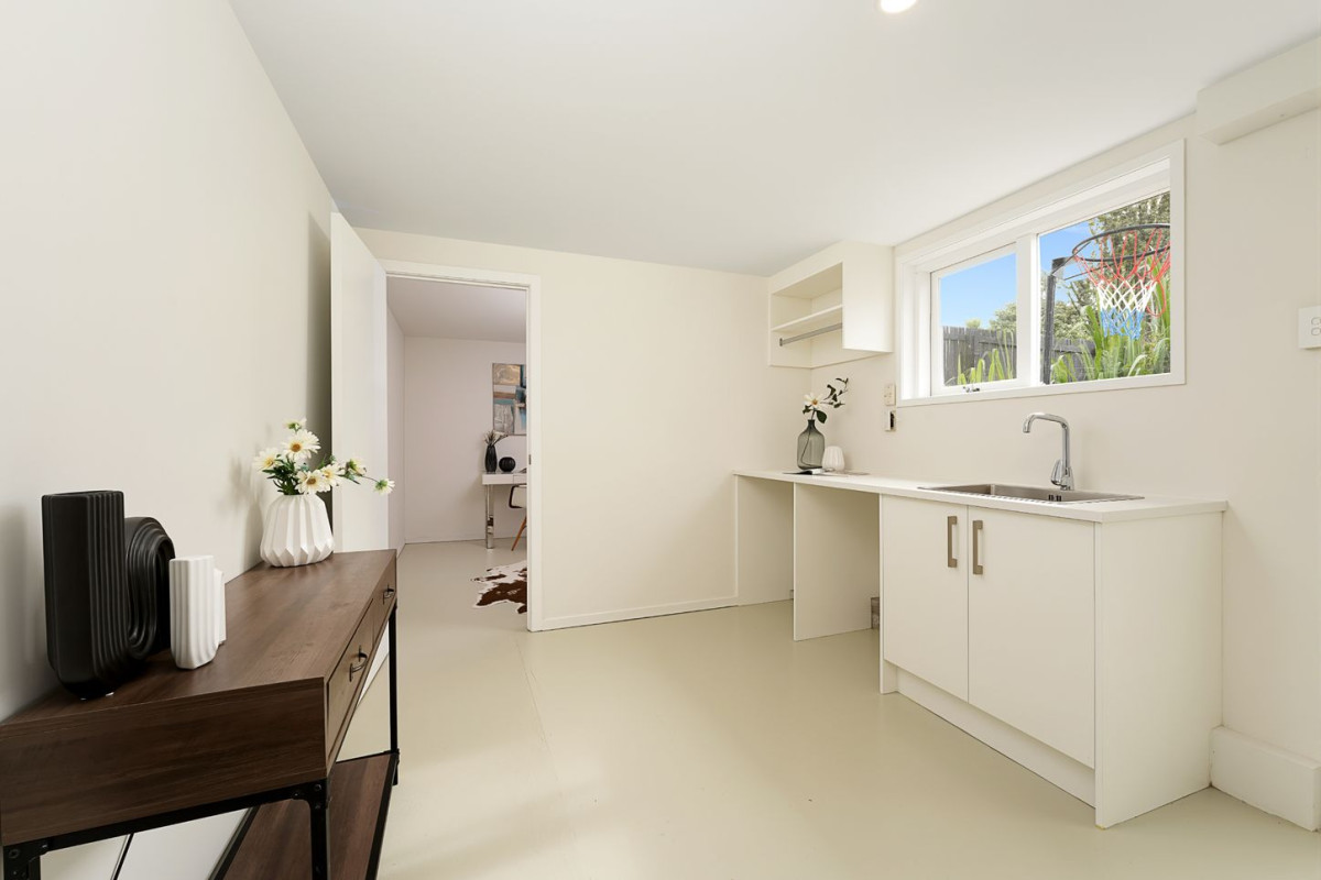 190m2 3 beds 1 bath house with garage on 723m2 section, upstairs 3 beds 1 bath kitchen and lounge, Downstairs opens up a world of possibilities. With a large, flexible area ready for transformation, Whether it’s creating room for extended family, a private retreat, a home business, or adding serious value, the choice is yours, 41 Spence Road, Henderson, Auckland