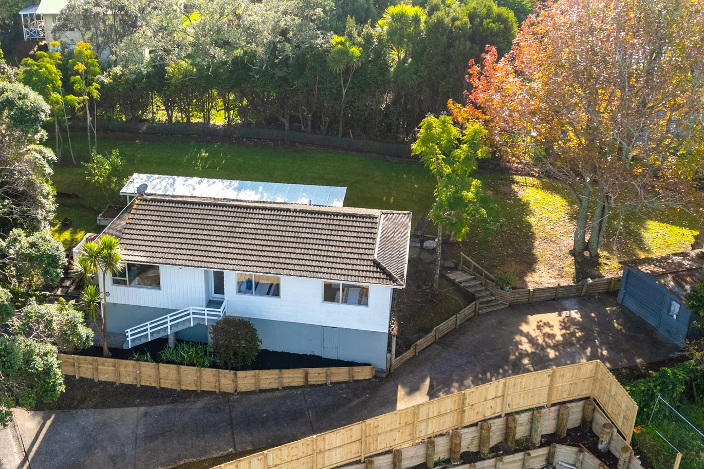 Renovated 3 beds 1 bath house on 1128m2 section, with a deck and pergola, a single garage and additional open parking spaces for up to five vehicles, 12 Glenbervie Crescent Massey,, Auckland