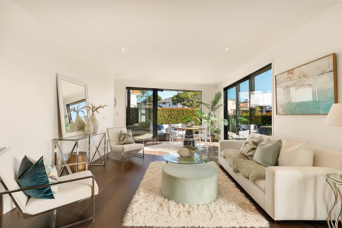 164m2 3 beds 2 baths home with double garage on 191m2 section, mature green fence lines frame the landscape, Both upstairs and downstairs bedrooms are thoughtfully positioned to embrace the water views, 118a Reihana Street, Orakei, Auckland