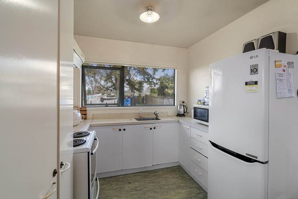 Standalone 3 beds 1 bath house with double garage on 414m2 section, Stroll to Te Atatu Peninsula Market, easy motorway access, 0.2 km to Matipo Road School, 0.9 km to Te Atatu Intermediate, 10A Holman Road, Te Atatu Peninsula, Auckland