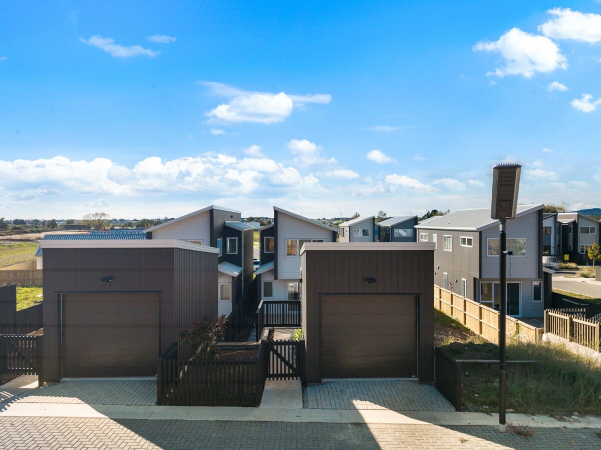 Brand standnew 3 beds 2.5 baths house, A separate garage provides flexibility for secure parking, storage, or additional utility, 10 & 12 Taiheru Road, Karaka, Auckland