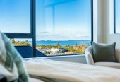 Uninterrupted sea views, 348m2 5 beds 5.5 baths house with double garage and 2-beds granny on 470m2 section, moments from Long Bay Beach and Long Bay Regional Park, shops, supermarket, schools, zoned for Long Bay College, Long Bay School, and Northcross Intermediate, 25 Kumukumu Road, Long Bay, Auckland