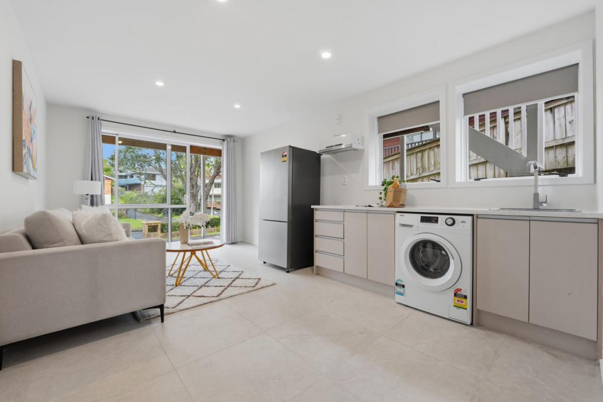 Home and Income, 7A Sailfish Drive, West Harbour, Auckland..160m2 4 beds 3 baths house with car parks on 468m2 section, Solid brick & cedar weatherboard cladding, Separate income area to help offset everyday living costs, close to schools, shops, motorway access & local amenities