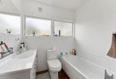 Double Westlake school zone, 688m2 section, 3 beds 1 bath house with double garage, zoned for Campbells Bay Primary and Westlake Boys’ & Girls’ High Schools, and just minutes to local shops, beaches, motorway access, 17 Catalina Crescent, Forrest Hill, Auckland