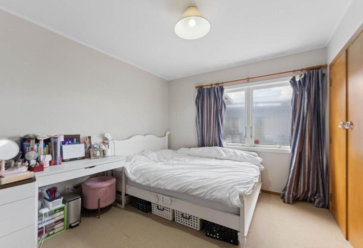 Double Westlake school zone, 688m2 section, 3 beds 1 bath house with double garage, zoned for Campbells Bay Primary and Westlake Boys’ & Girls’ High Schools, and just minutes to local shops, beaches, motorway access, 17 Catalina Crescent, Forrest Hill, Auckland