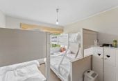 Double Westlake school zone, 688m2 section, 3 beds 1 bath house with double garage, zoned for Campbells Bay Primary and Westlake Boys’ & Girls’ High Schools, and just minutes to local shops, beaches, motorway access, 17 Catalina Crescent, Forrest Hill, Auckland