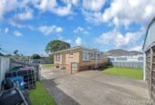 Brick 3 beds 1 bath house with standalone double garage on 561m2 section, close to Pukekohe township, schools, childcare centres, parks, and public transport, 0.2 km to Pukekohe North School, 34 Montgomery Avenue, Pukekohe, Auckland