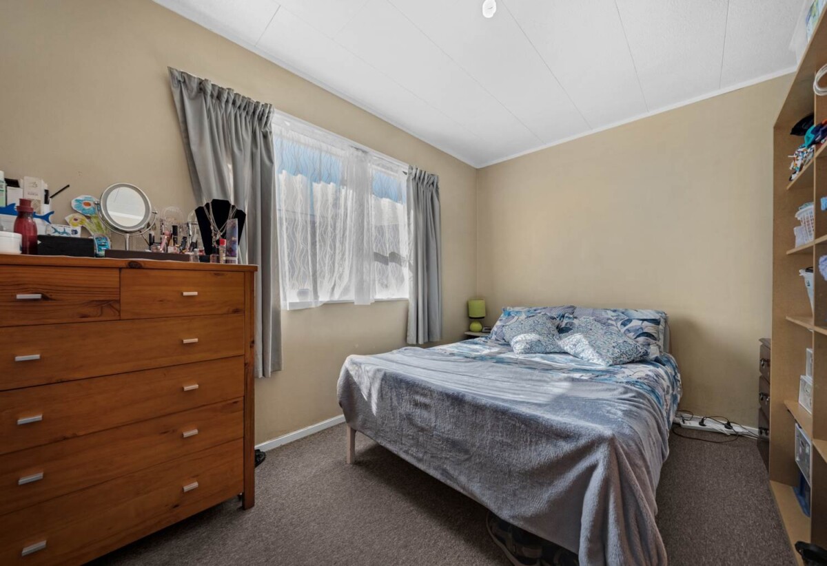 Home and income, 2 Standalone 2 beds 1 bath home with carport on 768m2 section ( one freehold title), currently tenanted, ( 1 tenant 9+ year and 2nd tenant 20+ years), Minutes to WestCity Waitakere shopping centre, schools, easy motorway access, 0.6 km to Waitakere College, 45A Mildmay Road, Henderson, Auckland