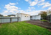 Freshly painted interior – move-in ready, 3 beds 1 bath house with standalone double garage and Additional rumpus room on 708m2 section, park across the road, close to shops, schools, motorway access, 0.3 km to Rosehill Intermediate, 0.4 km to Rosehill College, 41 Tatariki Street, Papakura, Auckland