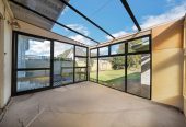 4 beds 2 baths house with standalone double garage on 1012m2 section, Approximately 600–700 metres to New Lynn Train Station and Bus Depot, Close to local shops, schools, and amenities, 0.3 km to Blockhouse Bay Intermediate, 125 Portage Road, New Lynn, Auckland