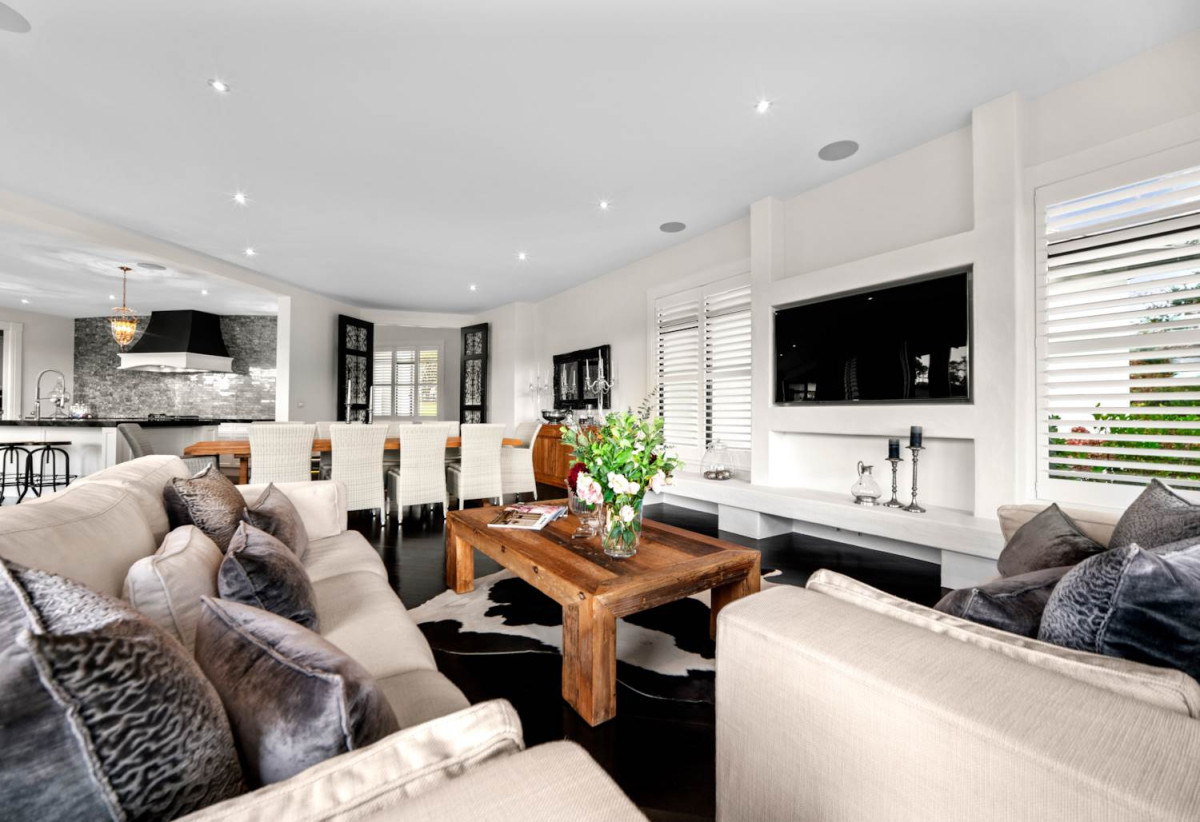 30,269m² section, The home offers 5 beds 3 baths, including a private guest suite with a designer ensuite featuring dual showers, A separate wing accommodates additional bedrooms and a luxurious family bathroom with a sculptural real stone bath, Underfloor heating throughout, A five-car garage, A formal 10-seater dining room beneath a genuine Swarovski crystal chandelier, integrated throughout the home is a premium HEOS multi-room audio system, a fully equipped private cinema with six luxury seats, The stunning 16.5-metre heated swimming pool (approx. 5.5–6m wide), 2.2 km to Riverhead School, 739 Coatesville-Riverhead Highway, Riverhead, Auckland