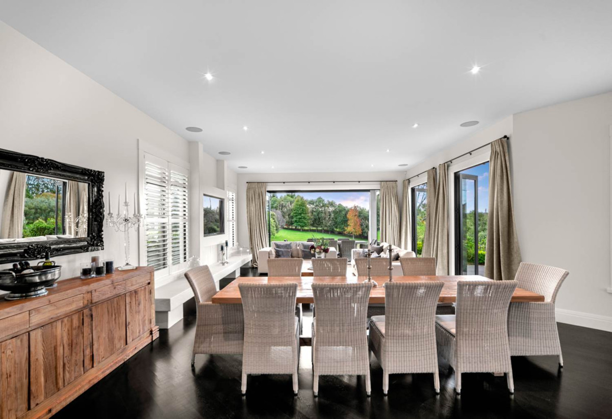 30,269m² section, The home offers 5 beds 3 baths, including a private guest suite with a designer ensuite featuring dual showers, A separate wing accommodates additional bedrooms and a luxurious family bathroom with a sculptural real stone bath, Underfloor heating throughout, A five-car garage, A formal 10-seater dining room beneath a genuine Swarovski crystal chandelier, integrated throughout the home is a premium HEOS multi-room audio system, a fully equipped private cinema with six luxury seats, The stunning 16.5-metre heated swimming pool (approx. 5.5–6m wide), 2.2 km to Riverhead School, 739 Coatesville-Riverhead Highway, Riverhead, Auckland