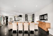 30,269m² section, The home offers 5 beds 3 baths, including a private guest suite with a designer ensuite featuring dual showers, A separate wing accommodates additional bedrooms and a luxurious family bathroom with a sculptural real stone bath, Underfloor heating throughout, A five-car garage, A formal 10-seater dining room beneath a genuine Swarovski crystal chandelier, integrated throughout the home is a premium HEOS multi-room audio system, a fully equipped private cinema with six luxury seats, The stunning 16.5-metre heated swimming pool (approx. 5.5–6m wide), 2.2 km to Riverhead School, 739 Coatesville-Riverhead Highway, Riverhead, Auckland