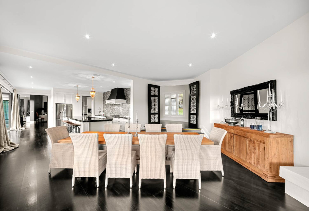 30,269m² section, The home offers 5 beds 3 baths, including a private guest suite with a designer ensuite featuring dual showers, A separate wing accommodates additional bedrooms and a luxurious family bathroom with a sculptural real stone bath, Underfloor heating throughout, A five-car garage, A formal 10-seater dining room beneath a genuine Swarovski crystal chandelier, integrated throughout the home is a premium HEOS multi-room audio system, a fully equipped private cinema with six luxury seats, The stunning 16.5-metre heated swimming pool (approx. 5.5–6m wide), 2.2 km to Riverhead School, 739 Coatesville-Riverhead Highway, Riverhead, Auckland