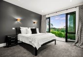 30,269m² section, The home offers 5 beds 3 baths, including a private guest suite with a designer ensuite featuring dual showers, A separate wing accommodates additional bedrooms and a luxurious family bathroom with a sculptural real stone bath, Underfloor heating throughout, A five-car garage, A formal 10-seater dining room beneath a genuine Swarovski crystal chandelier, integrated throughout the home is a premium HEOS multi-room audio system, a fully equipped private cinema with six luxury seats, The stunning 16.5-metre heated swimming pool (approx. 5.5–6m wide), 2.2 km to Riverhead School, 739 Coatesville-Riverhead Highway, Riverhead, Auckland