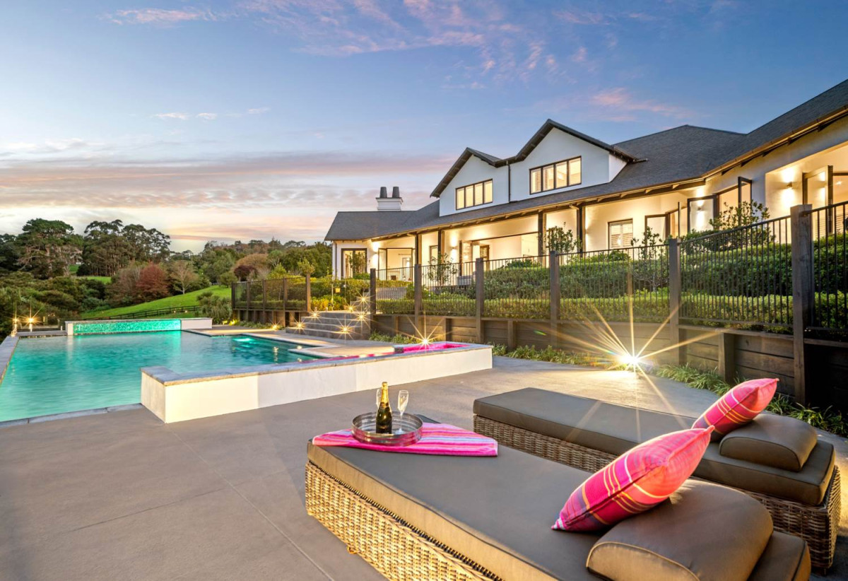 30,269m² section, The home offers 5 beds 3 baths, including a private guest suite with a designer ensuite featuring dual showers, A separate wing accommodates additional bedrooms and a luxurious family bathroom with a sculptural real stone bath, Underfloor heating throughout, A five-car garage, A formal 10-seater dining room beneath a genuine Swarovski crystal chandelier, integrated throughout the home is a premium HEOS multi-room audio system, a fully equipped private cinema with six luxury seats, The stunning 16.5-metre heated swimming pool (approx. 5.5–6m wide), 2.2 km to Riverhead School, 739 Coatesville-Riverhead Highway, Riverhead, Auckland