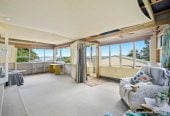 The vendor is under pressure and needs it go, 2 standalone Dwellings on 837m2 section, Front dwelling offers multiple bedrooms, bathroom facilities, and double garage, Rear home has been modified from its original layout and offers additional living space, close to beaches, shops, and local amenities, 1.1 km to Stanmore Bay School, 4 Brian Crescent, Stanmore Bay, Auckland