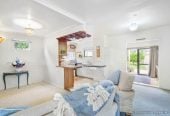 The vendor is under pressure and needs it go, 2 standalone Dwellings on 837m2 section, Front dwelling offers multiple bedrooms, bathroom facilities, and double garage, Rear home has been modified from its original layout and offers additional living space, close to beaches, shops, and local amenities, 1.1 km to Stanmore Bay School, 4 Brian Crescent, Stanmore Bay, Auckland