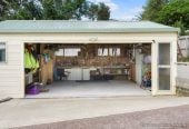 The vendor is under pressure and needs it go, 2 standalone Dwellings on 837m2 section, Front dwelling offers multiple bedrooms, bathroom facilities, and double garage, Rear home has been modified from its original layout and offers additional living space, close to beaches, shops, and local amenities, 1.1 km to Stanmore Bay School, 4 Brian Crescent, Stanmore Bay, Auckland