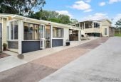 The vendor is under pressure and needs it go, 2 standalone Dwellings on 837m2 section, Front dwelling offers multiple bedrooms, bathroom facilities, and double garage, Rear home has been modified from its original layout and offers additional living space, close to beaches, shops, and local amenities, 1.1 km to Stanmore Bay School, 4 Brian Crescent, Stanmore Bay, Auckland