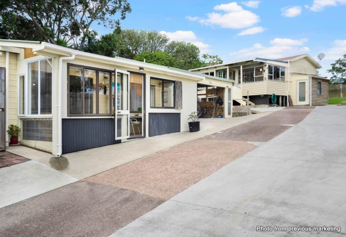 The vendor is under pressure and needs it go, 2 standalone Dwellings on 837m2 section, Front dwelling offers multiple bedrooms, bathroom facilities, and double garage, Rear home has been modified from its original layout and offers additional living space, close to beaches, shops, and local amenities, 1.1 km to Stanmore Bay School, 4 Brian Crescent, Stanmore Bay, Auckland