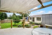 The vendor is under pressure and needs it go, 2 standalone Dwellings on 837m2 section, Front dwelling offers multiple bedrooms, bathroom facilities, and double garage, Rear home has been modified from its original layout and offers additional living space, close to beaches, shops, and local amenities, 1.1 km to Stanmore Bay School, 4 Brian Crescent, Stanmore Bay, Auckland