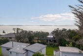 2 beds 1 bath house on 1563m2 section, Zoned Single House Zone, within walking distance of the beach and local shopping centre, golf club, 0.9 km to Gulf Harbour School, 1364 Whangaparaoa Road, Army Bay, Auckland