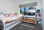 Overseas Owner ready to meet the market. (CV 2024: $1.175M), 3 beds 2.5 baths house with garage on 195m2 section, close to schools, shops, supermarket, motorway access, 0.3 km to Hobsonville Point Secondary School, 0.4 km to Hobsonville Point Primary School, 2 Rarahu Road, Hobsonville, Auckland