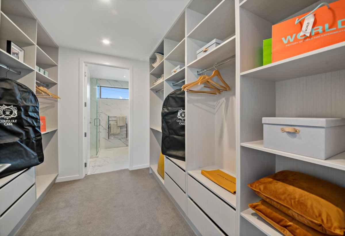 Built-in lift, 251m2 Sea Views 4 beds (2 ensuites) 3 baths home with double garage, Directly opposite Kohimarama School and a short stroll to the waterfront and village amenities, 0.9 km to Selwyn College, 4B Rawhitiroa Road, Kohimarama, Auckland