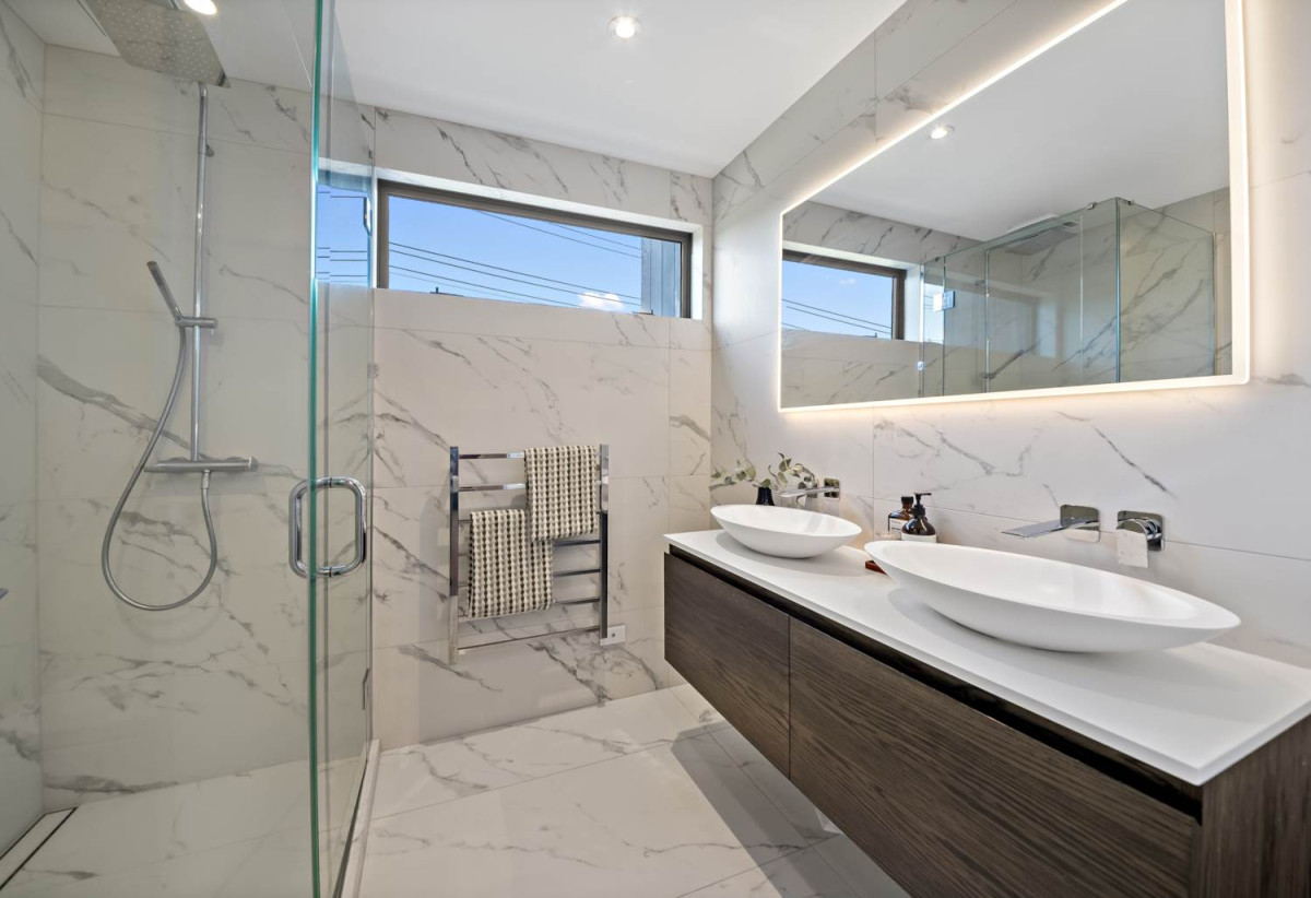 Built-in lift, 251m2 Sea Views 4 beds (2 ensuites) 3 baths home with double garage, Directly opposite Kohimarama School and a short stroll to the waterfront and village amenities, 0.9 km to Selwyn College, 4B Rawhitiroa Road, Kohimarama, Auckland