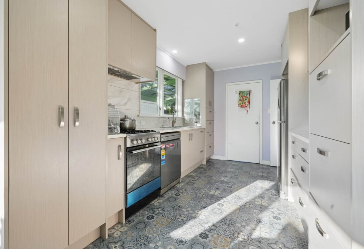 846m2 section, 3 beds 1.5baths house with double garage, 3 beds 1.5 baths kitchen lounge upstairs, Downstairs 3 rumpus bonus rumpus area currently set up with additional bedroom style spaces and kitchenette area, close to school, Lynn Mall, 0.3 km to Kelston School, 21 Kelwyn Road, Kelston, Auckland