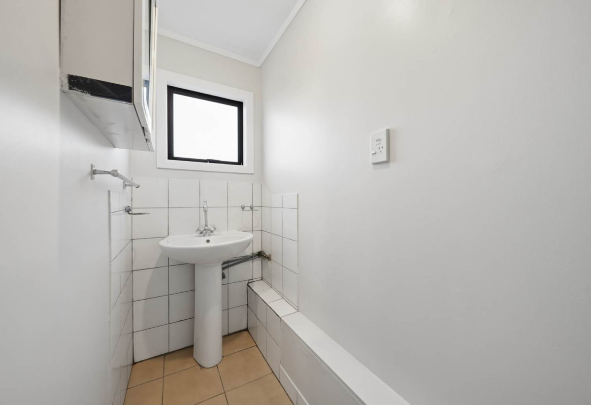 846m2 section, 3 beds 1.5baths house with double garage, 3 beds 1.5 baths kitchen lounge upstairs, Downstairs 3 rumpus bonus rumpus area currently set up with additional bedroom style spaces and kitchenette area, close to school, Lynn Mall, 0.3 km to Kelston School, 21 Kelwyn Road, Kelston, Auckland