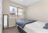 2 kitchens, 4 beds 3 baths house with garage and 1-bed granny on 402m2 section, close to schools, shops, 1 km to Cosgrove School, 9 Holcroft Street, Papakura, Auckland