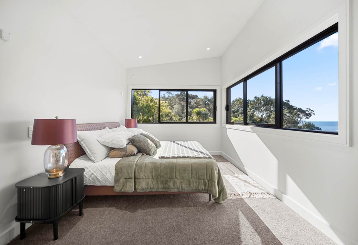 Rangitoto College zone, Sea Views, 4 beds (4 ensuites) 4.5 baths house with swimming pool and double garage, Direct private walkway to Churchill Cove Beach and reserve, close to schools, shops, supermarket, 0.9 km to Murrays Bay School, 61B Churchill Road, Murrays Bay, Auckland